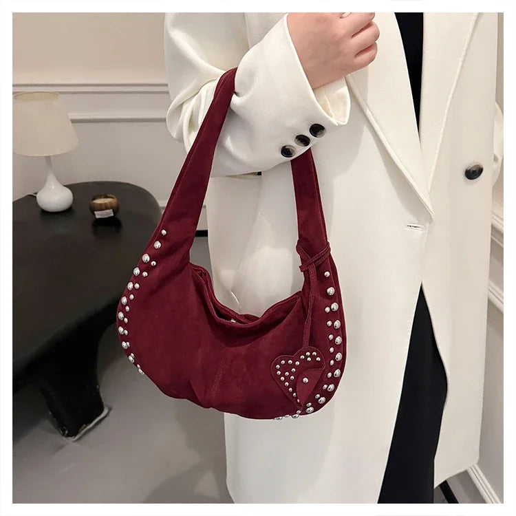 Chic suede shoulder bag with decorative strass