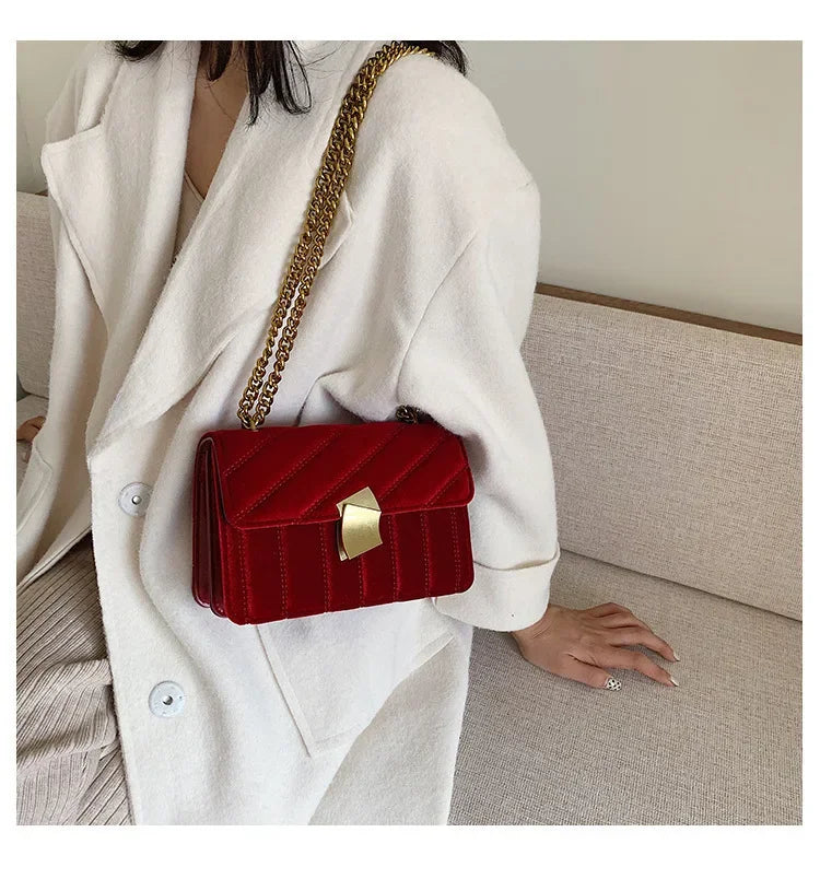 Corduroy handbag with chain and flap closure