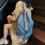 Washed denim backpack with adjustable straps