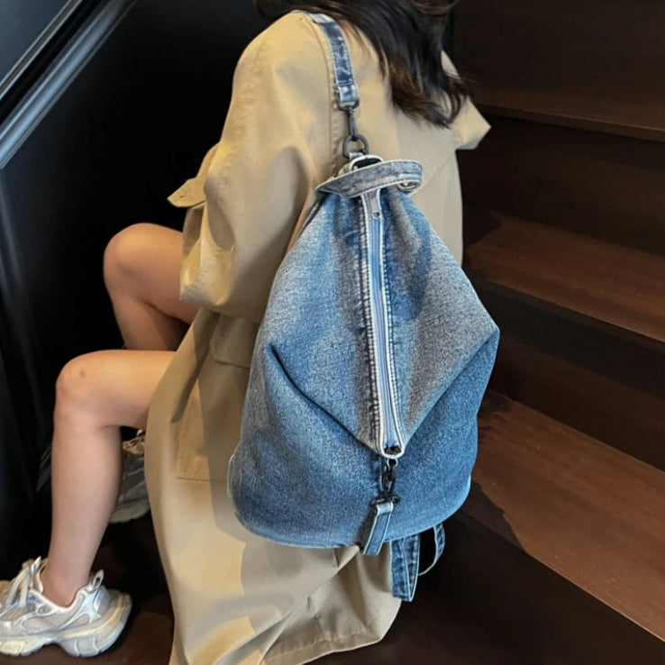Washed denim backpack with adjustable straps