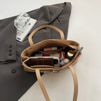 Soft-touch leather shoulder bag