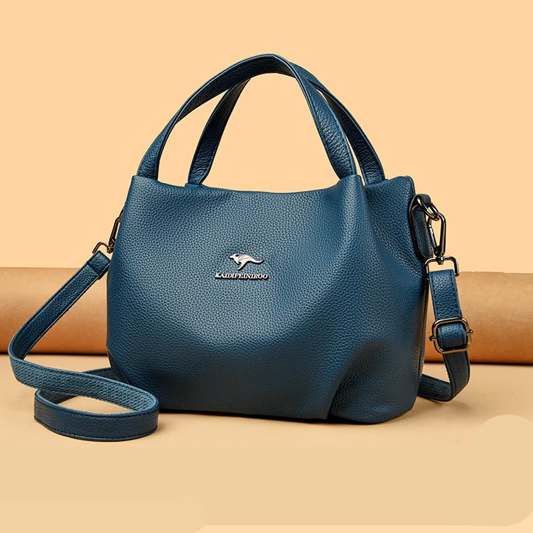 Leather handbag with wide base