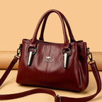 Leather handbag with detachable shoulder strap