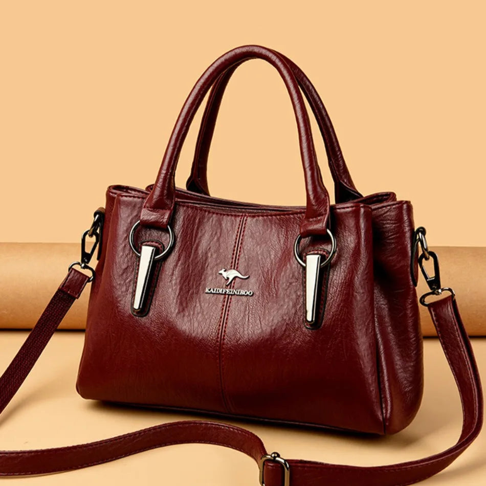Leather handbag with detachable shoulder strap