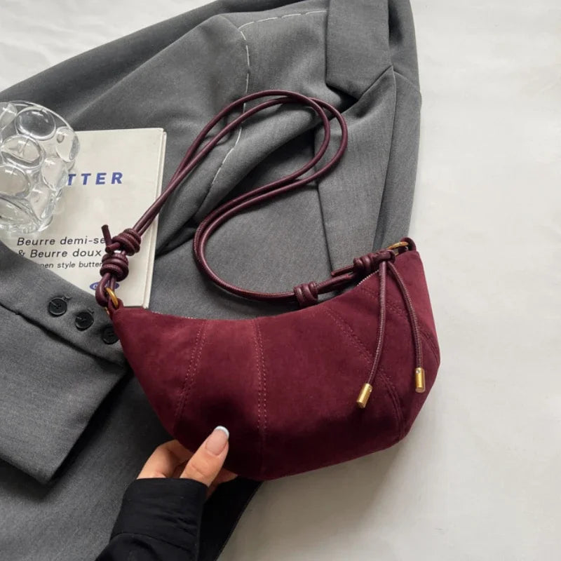 Crescent suede hobo bag