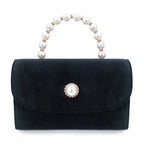 Corduroy clutch bag with envelope flap design