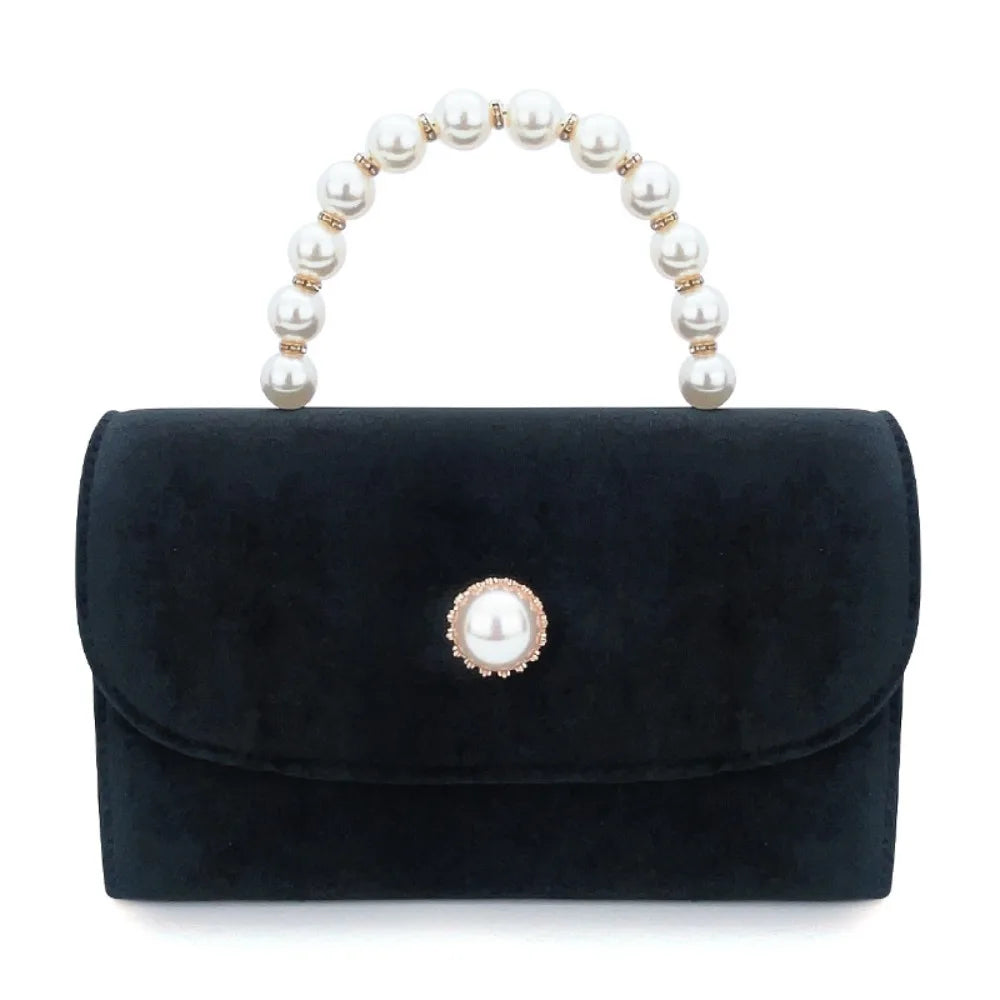 Corduroy clutch bag with envelope flap design