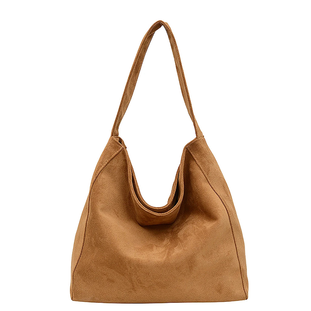 Suede slouch bag with relaxed boho silhouette