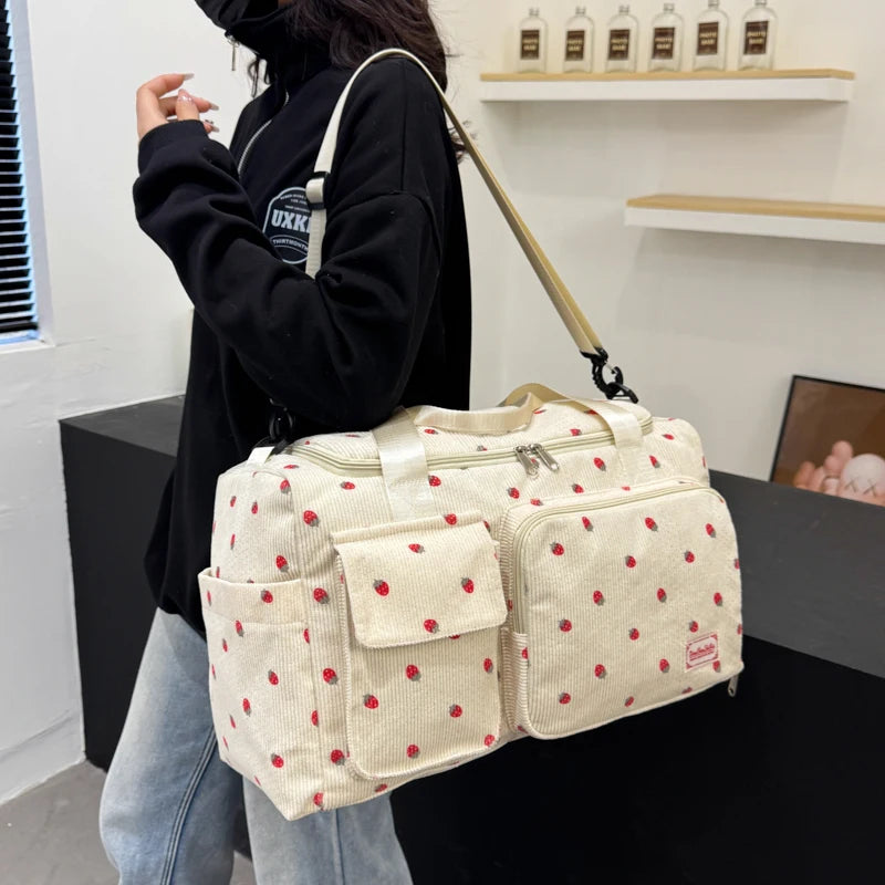 Corduroy travel toiletry bag with shoulder strap