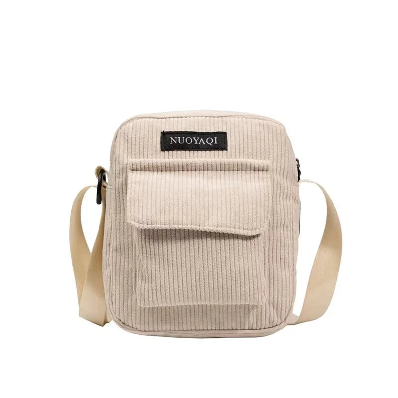 Corduroy crossbody handbag with front pocket