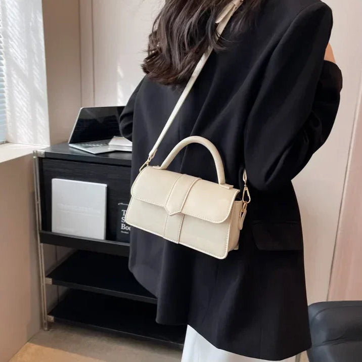 Compact leather sling bag for daily essentials