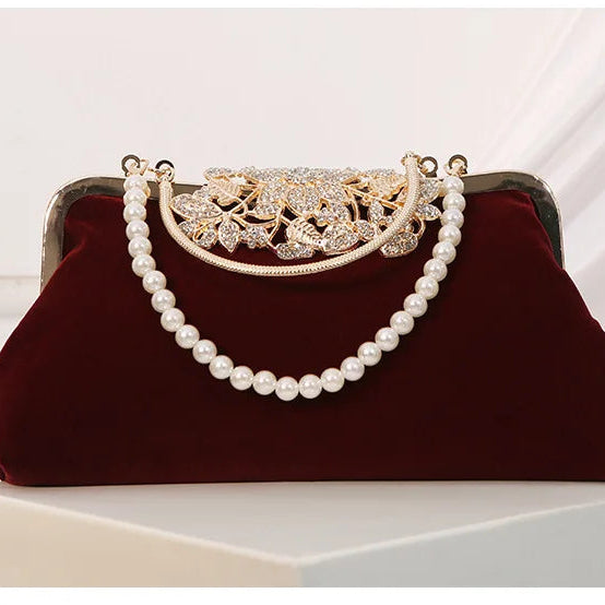 Corduroy clutch bag with decorative closure