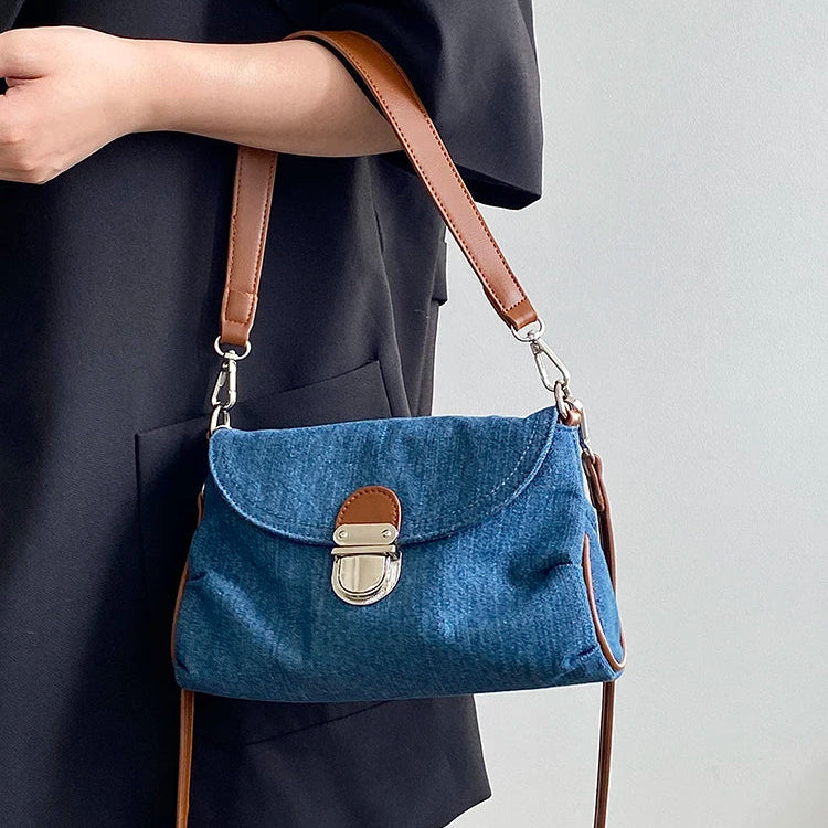 Denim handbag with leather handles