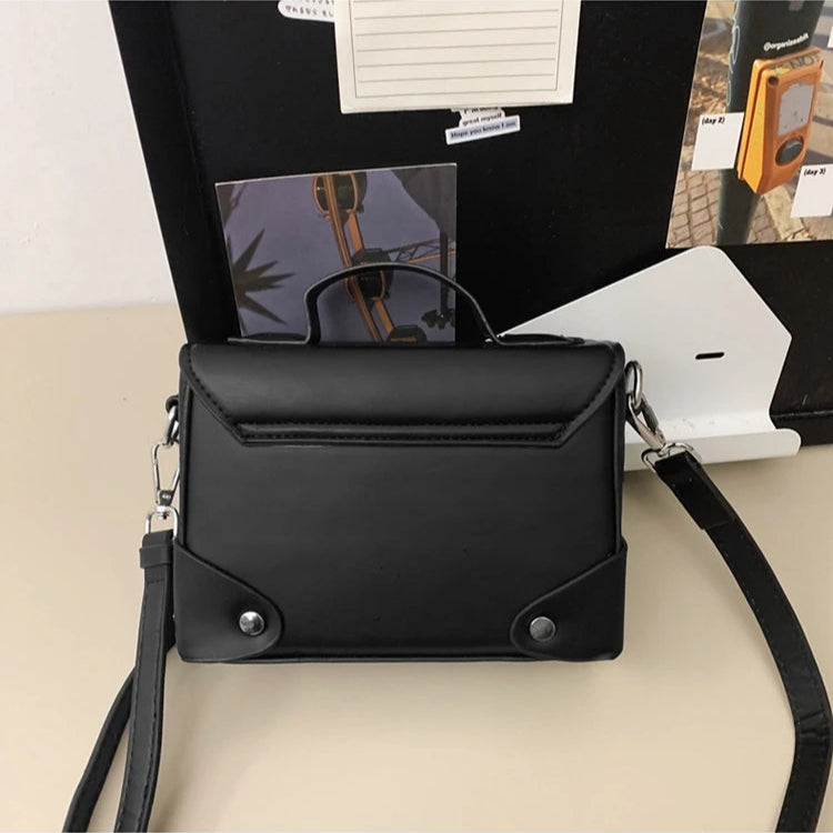 Compact leather crossbody bag