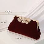 Corduroy clutch bag with decorative closure