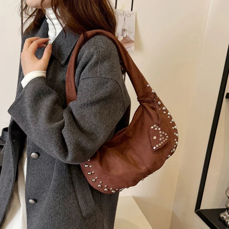 Chic suede shoulder bag with decorative strass
