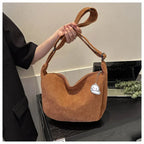 Corduroy handbag with adjustable shoulder strap