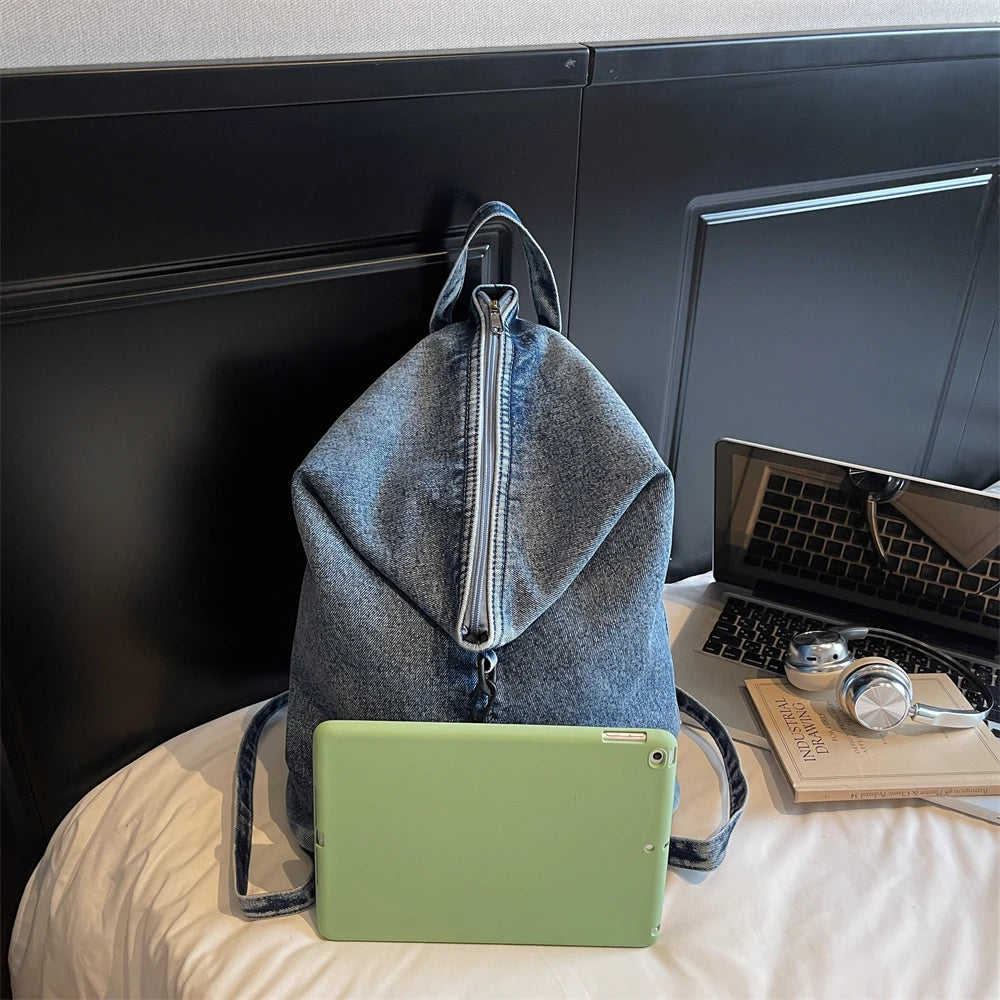 Washed denim backpack with adjustable straps