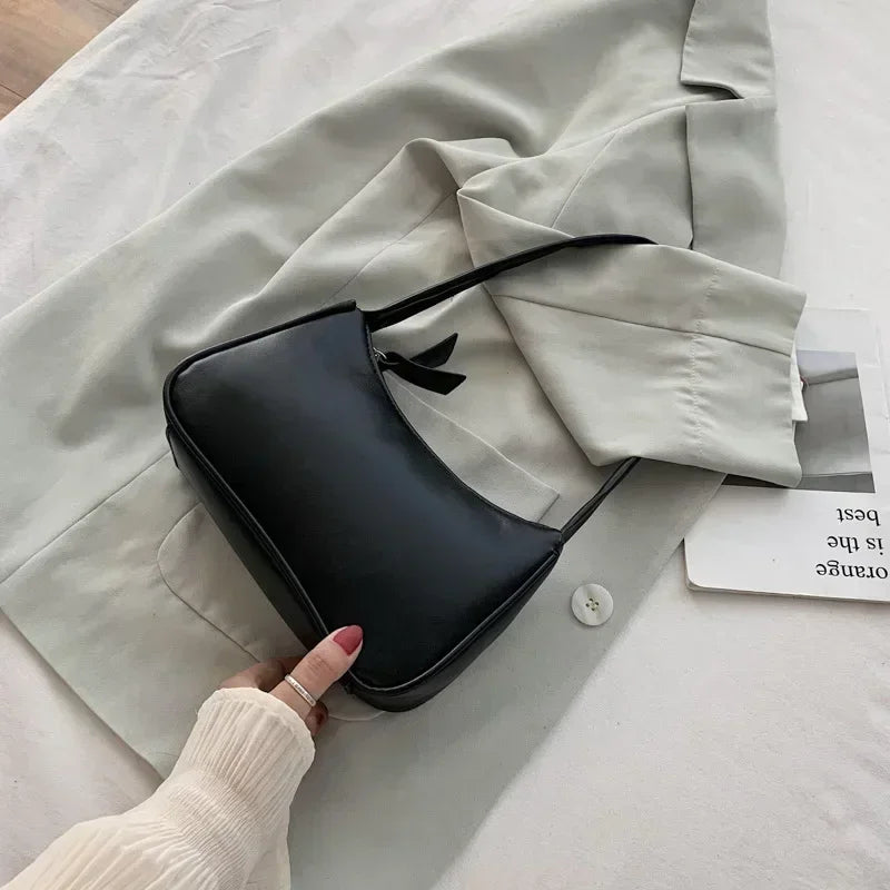 Minimal leather sling crossbody