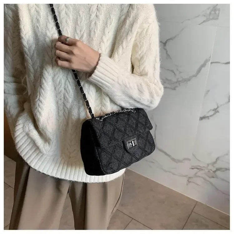 Compact flap denim handbag