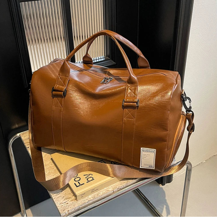 Slim leather duffle bag
