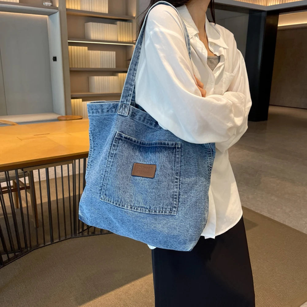 Fashion denim tote bag with leather patch