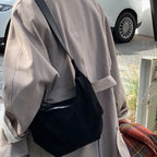 Soft suede slouch bag with single shoulder carry