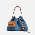 Denim handbag with external pockets