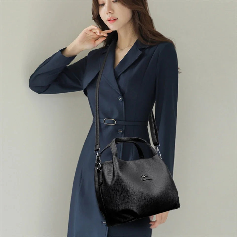 Leather handbag with wide base
