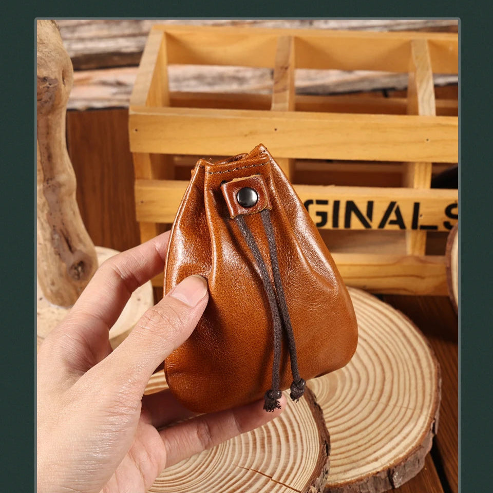 Compact drawstring pouch in leather