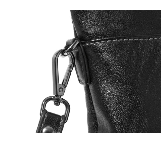 Minimalist leather clutch with detachable strap