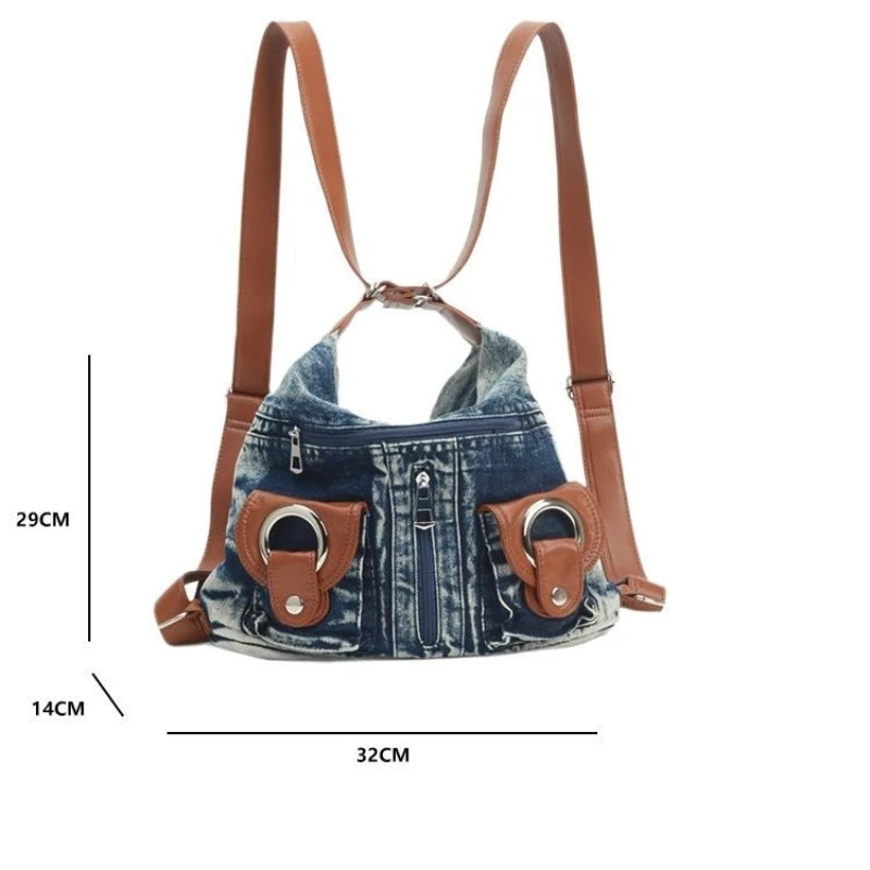 Trendy denim backpack with leather strap detail