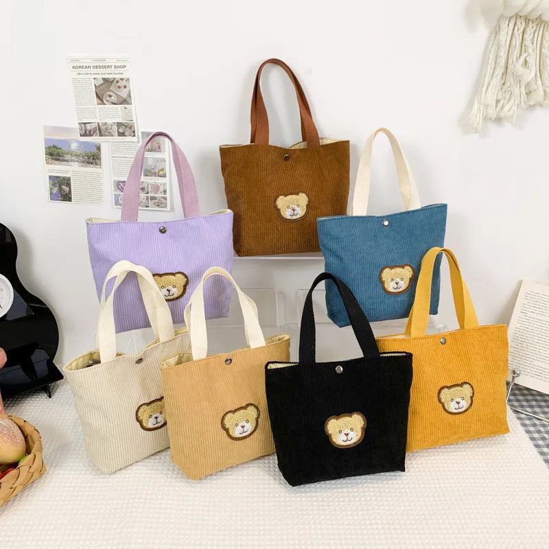 Women’s corduroy shoulder tote bag with front patch