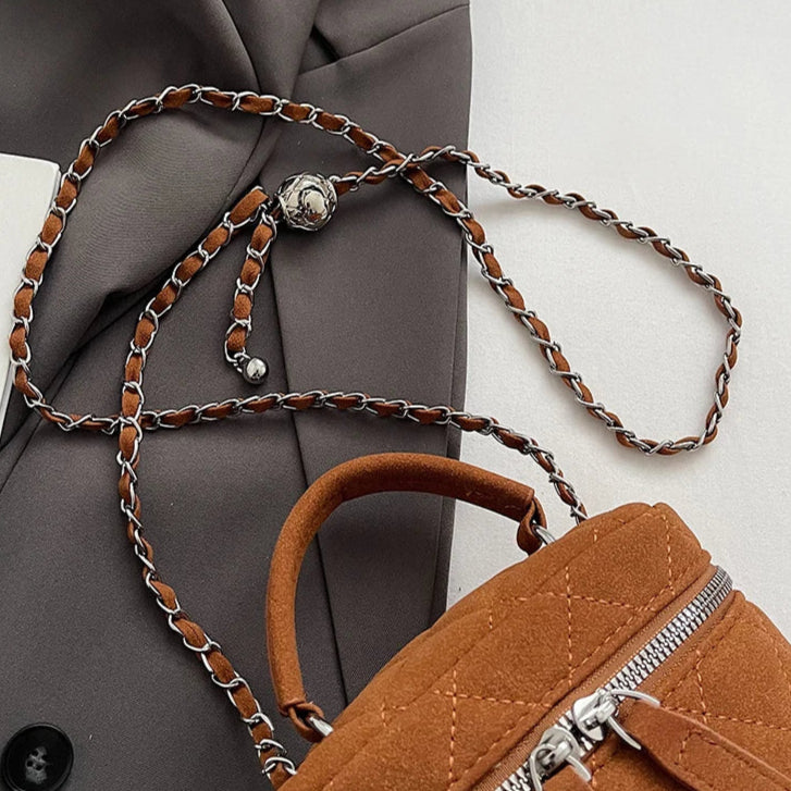 Classic suede handbag with structured handle