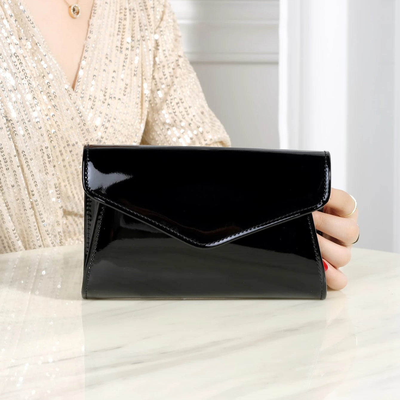 Minimal leather handbag with slim profile