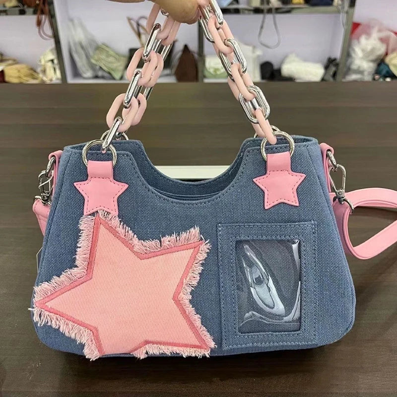 Denim handbag with star patches
