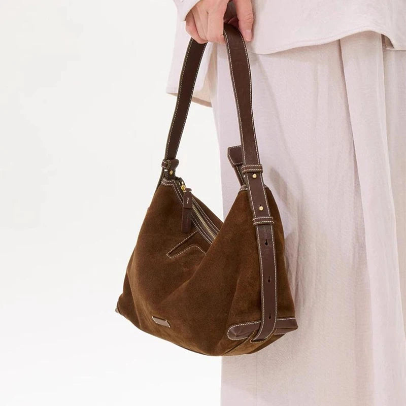Sleek suede handbag for travel and errands