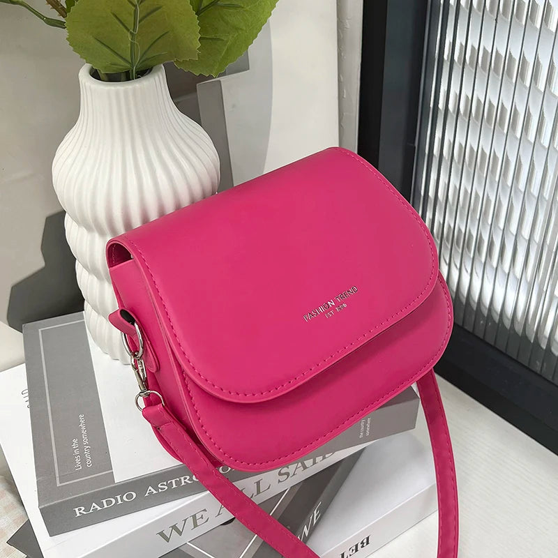 Compact leather sling crossbody