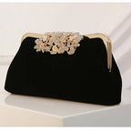 Corduroy clutch bag with decorative closure