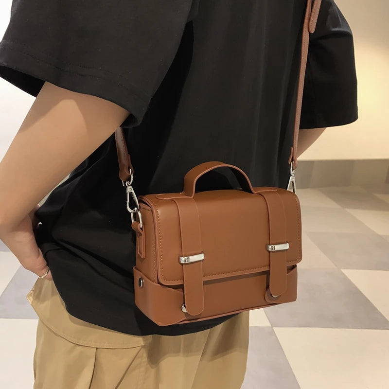 Compact leather crossbody bag