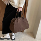 Suede handbag with shoulder strap