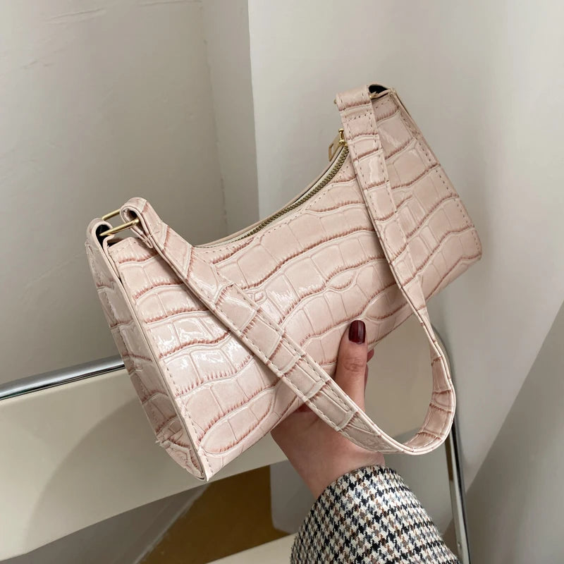 Small leather sling pouch