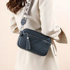 Textured leather crossbody bag