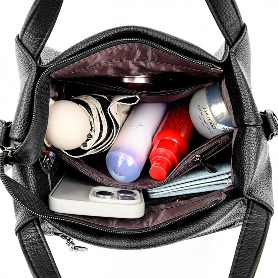 Leather handbag with wide base