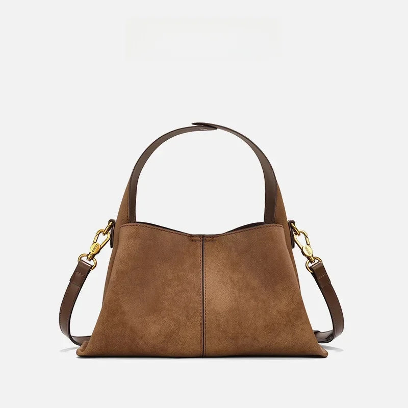 Suede handbag with rounded handles and zip closure