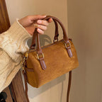 High-end suede purse with structured body
