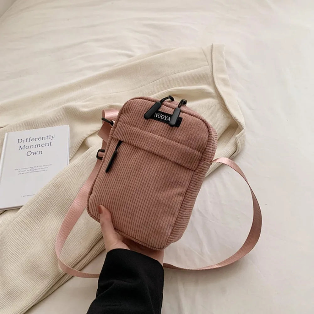 Compact corduroy crossbody bag