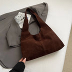 Slouch-style suede handbag