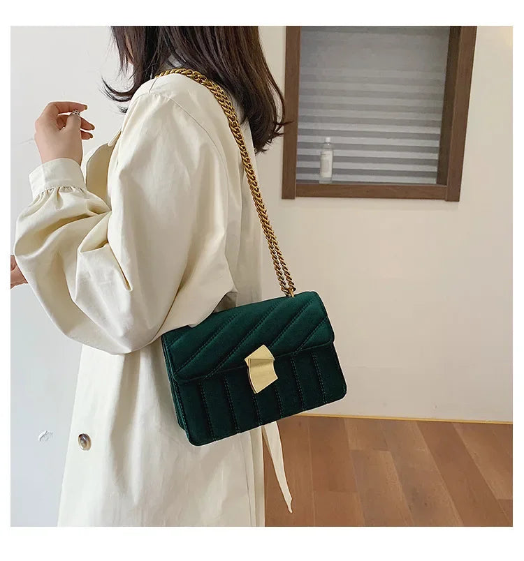 Corduroy handbag with chain and flap closure