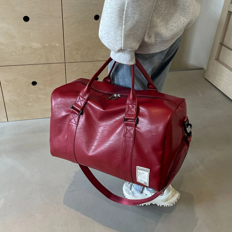 Slim leather duffle bag